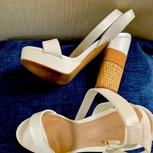 Also white platform heels with cork heel.